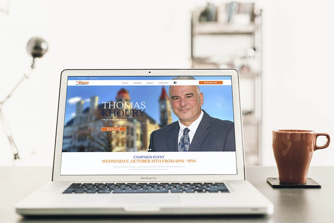 Thomas Khoury for school committee website on a laptop